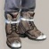 Refugee boots hunter leg armor icon1.jpg